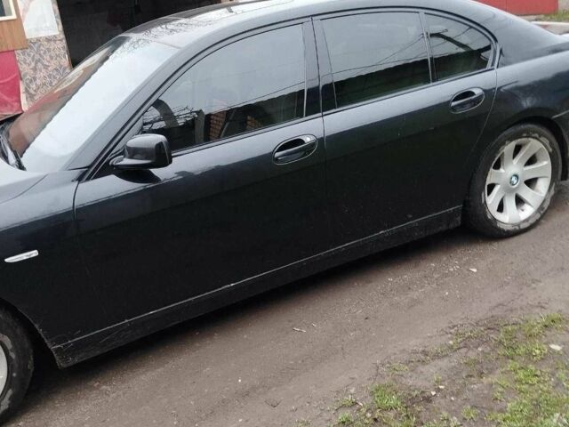 Черный БМВ 7 Серия, объемом двигателя 4.8 л и пробегом 300 тыс. км за 6500 $, фото 1 на Automoto.ua