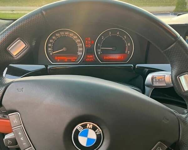 Черный БМВ 7 Серия, объемом двигателя 4.8 л и пробегом 310 тыс. км за 11550 $, фото 4 на Automoto.ua