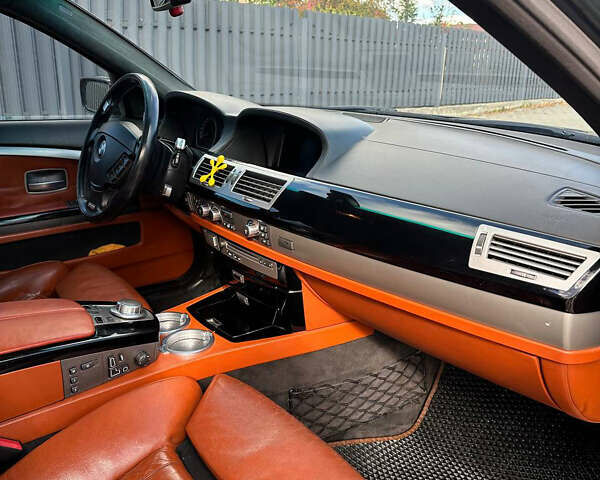 Черный БМВ 7 Серия, объемом двигателя 4 л и пробегом 403 тыс. км за 8500 $, фото 24 на Automoto.ua