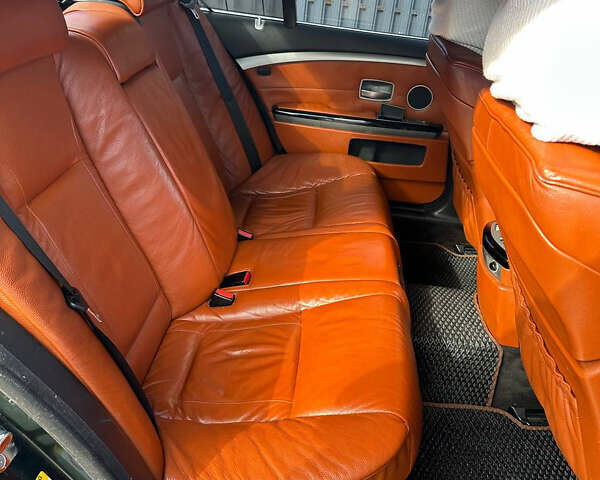 Черный БМВ 7 Серия, объемом двигателя 4 л и пробегом 403 тыс. км за 8500 $, фото 18 на Automoto.ua