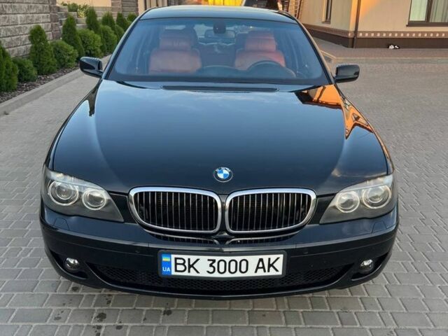 Черный БМВ 7 Серия, объемом двигателя 4.8 л и пробегом 310 тыс. км за 11550 $, фото 2 на Automoto.ua