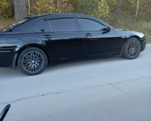 Черный БМВ 7 Серия, объемом двигателя 4.8 л и пробегом 331 тыс. км за 10500 $, фото 4 на Automoto.ua