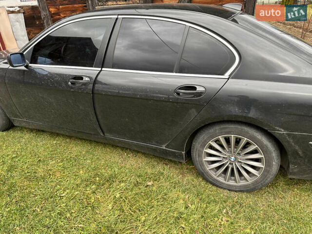 Черный БМВ 7 Серия, объемом двигателя 3 л и пробегом 280 тыс. км за 9800 $, фото 12 на Automoto.ua