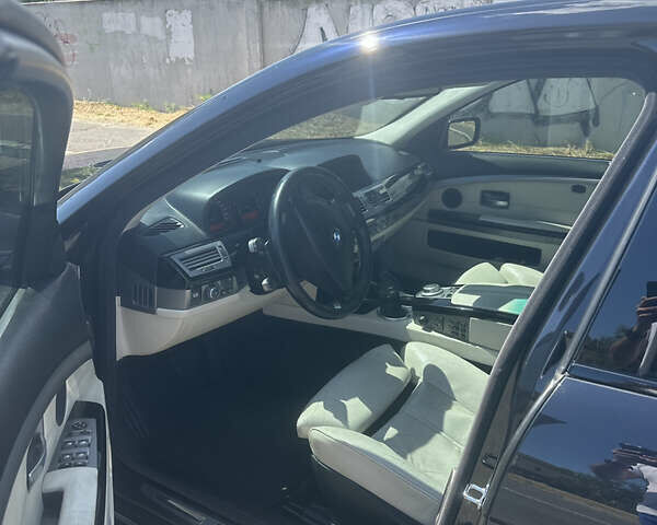 Черный БМВ 7 Серия, объемом двигателя 4.8 л и пробегом 304 тыс. км за 13000 $, фото 4 на Automoto.ua