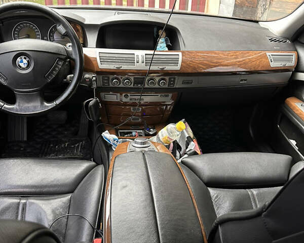 Черный БМВ 7 Серия, объемом двигателя 3 л и пробегом 280 тыс. км за 9800 $, фото 7 на Automoto.ua