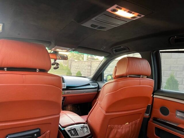 Черный БМВ 7 Серия, объемом двигателя 4.8 л и пробегом 310 тыс. км за 11550 $, фото 6 на Automoto.ua