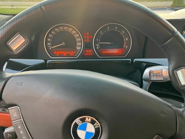 Черный БМВ 7 Серия, объемом двигателя 4.8 л и пробегом 310 тыс. км за 11550 $, фото 5 на Automoto.ua