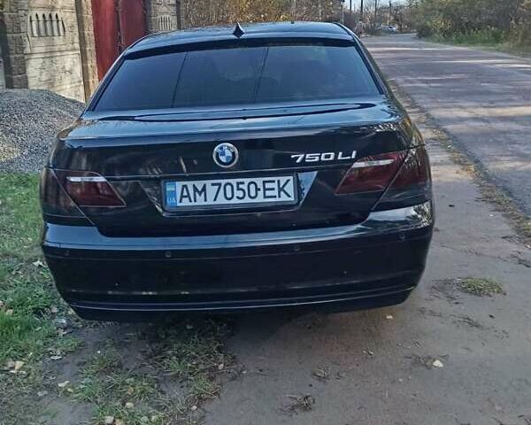 Черный БМВ 7 Серия, объемом двигателя 4.8 л и пробегом 331 тыс. км за 10500 $, фото 8 на Automoto.ua