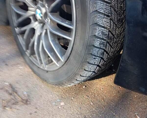 Черный БМВ 7 Серия, объемом двигателя 4.8 л и пробегом 331 тыс. км за 10500 $, фото 1 на Automoto.ua