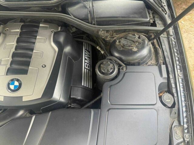 Чорний БМВ 7 Серія, об'ємом двигуна 4 л та пробігом 210 тис. км за 7700 $, фото 13 на Automoto.ua