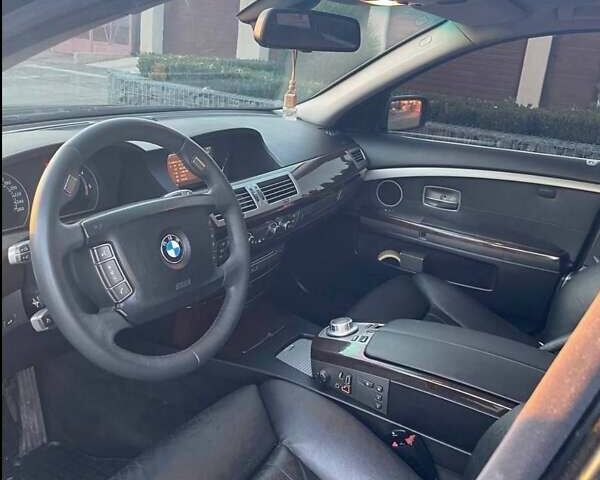 Черный БМВ 7 Серия, объемом двигателя 3 л и пробегом 360 тыс. км за 10500 $, фото 1 на Automoto.ua