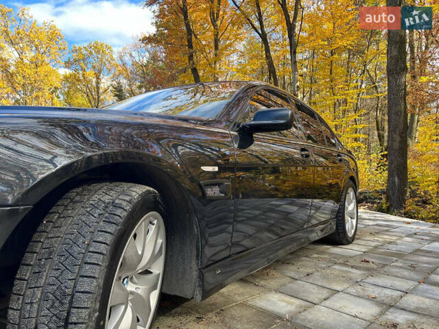 Черный БМВ 7 Серия, объемом двигателя 4.8 л и пробегом 205 тыс. км за 9000 $, фото 8 на Automoto.ua