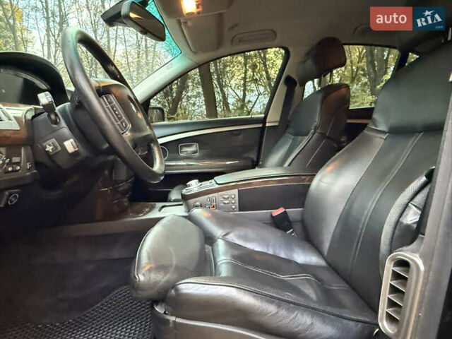 Черный БМВ 7 Серия, объемом двигателя 4.8 л и пробегом 270 тыс. км за 7350 $, фото 1 на Automoto.ua