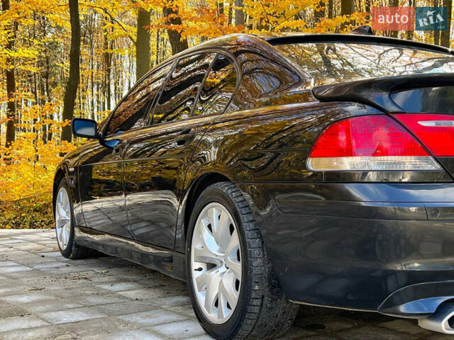 Черный БМВ 7 Серия, объемом двигателя 4.8 л и пробегом 205 тыс. км за 9000 $, фото 12 на Automoto.ua