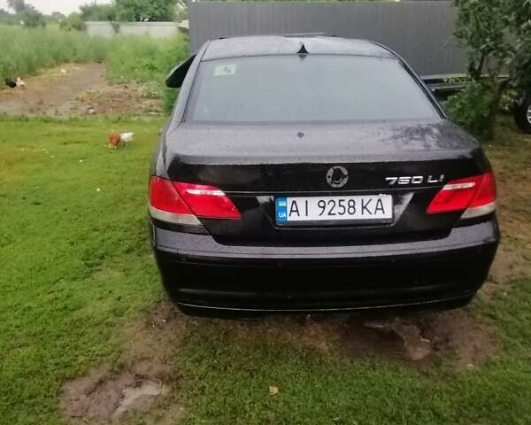 Черный БМВ 7 Серия, объемом двигателя 4.8 л и пробегом 201 тыс. км за 2344 $, фото 15 на Automoto.ua