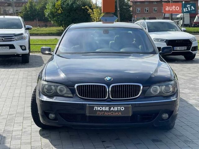 Черный БМВ 7 Серия, объемом двигателя 4.5 л и пробегом 215 тыс. км за 16000 $, фото 1 на Automoto.ua