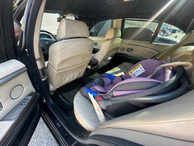 Черный БМВ 7 Серия, объемом двигателя 3 л и пробегом 340 тыс. км за 10000 $, фото 5 на Automoto.ua