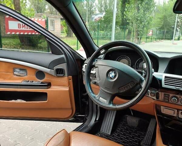 Черный БМВ 7 Серия, объемом двигателя 4.8 л и пробегом 224 тыс. км за 14000 $, фото 11 на Automoto.ua