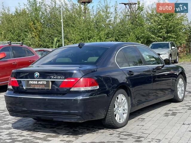 Черный БМВ 7 Серия, объемом двигателя 4.5 л и пробегом 215 тыс. км за 16000 $, фото 6 на Automoto.ua
