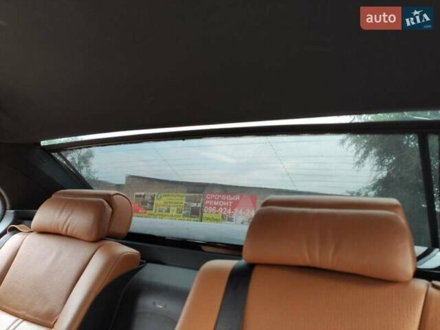 Черный БМВ 7 Серия, объемом двигателя 4.8 л и пробегом 224 тыс. км за 14000 $, фото 18 на Automoto.ua