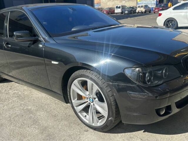 Черный БМВ 7 Серия, объемом двигателя 3 л и пробегом 340 тыс. км за 10000 $, фото 1 на Automoto.ua