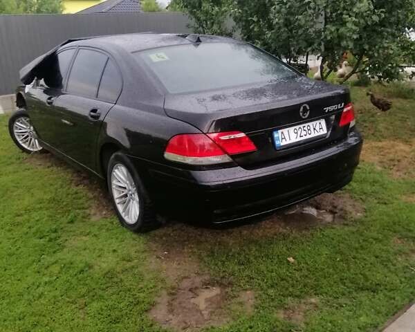 Черный БМВ 7 Серия, объемом двигателя 4.8 л и пробегом 201 тыс. км за 2344 $, фото 17 на Automoto.ua