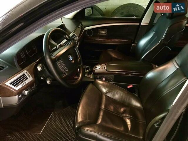 Черный БМВ 7 Серия, объемом двигателя 4.8 л и пробегом 283 тыс. км за 7000 $, фото 1 на Automoto.ua