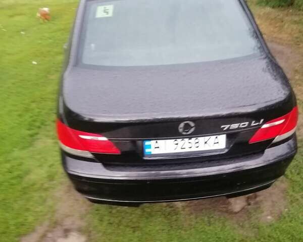 Черный БМВ 7 Серия, объемом двигателя 4.8 л и пробегом 201 тыс. км за 2344 $, фото 14 на Automoto.ua