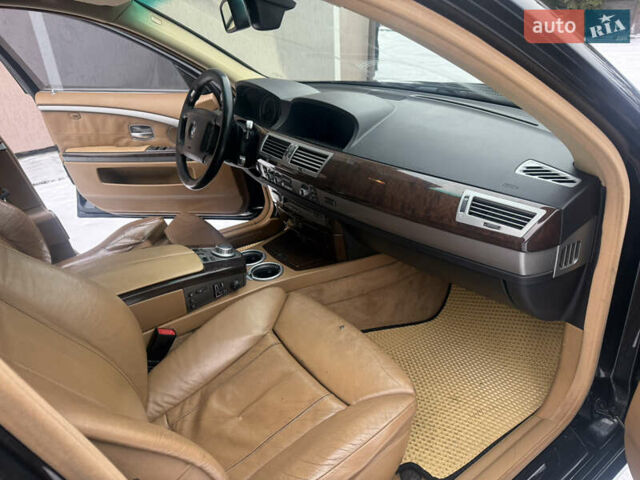 Черный БМВ 7 Серия, объемом двигателя 3 л и пробегом 421 тыс. км за 10000 $, фото 13 на Automoto.ua