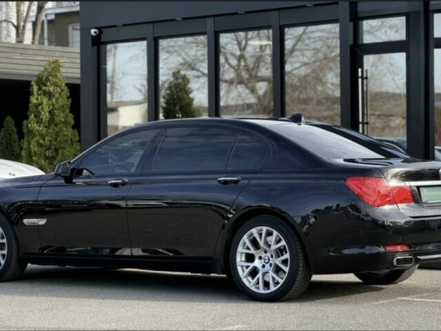 Черный БМВ 7 Серия, объемом двигателя 4.4 л и пробегом 141 тыс. км за 12500 $, фото 4 на Automoto.ua