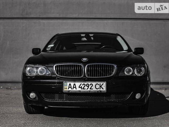 Черный БМВ 7 Серия, объемом двигателя 4 л и пробегом 230 тыс. км за 9000 $, фото 1 на Automoto.ua