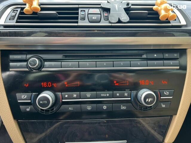 Черный БМВ 7 Серия, объемом двигателя 3 л и пробегом 298 тыс. км за 14290 $, фото 28 на Automoto.ua