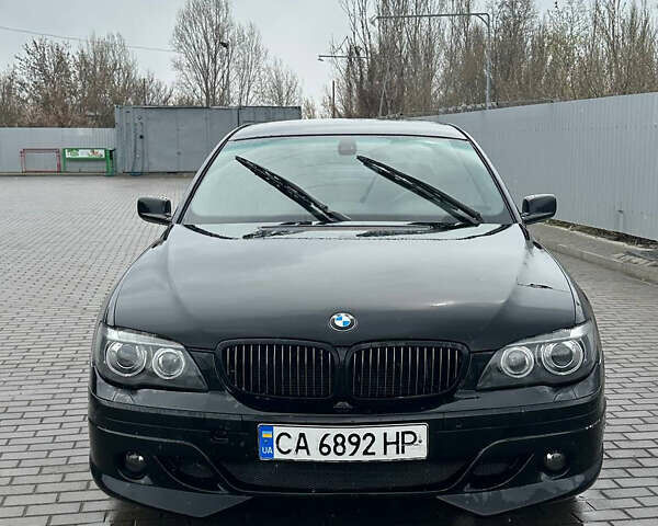 Черный БМВ 7 Серия, объемом двигателя 4.8 л и пробегом 270 тыс. км за 9490 $, фото 1 на Automoto.ua