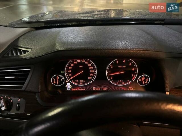 Черный БМВ 7 Серия, объемом двигателя 2.98 л и пробегом 300 тыс. км за 17000 $, фото 4 на Automoto.ua