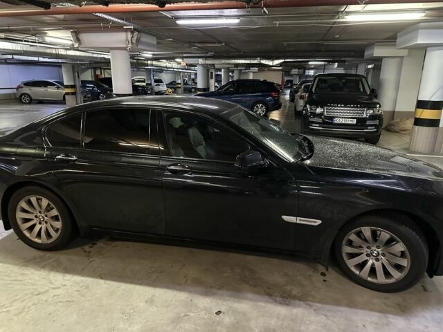 Черный БМВ 7 Серия, объемом двигателя 3 л и пробегом 300 тыс. км за 17000 $, фото 1 на Automoto.ua