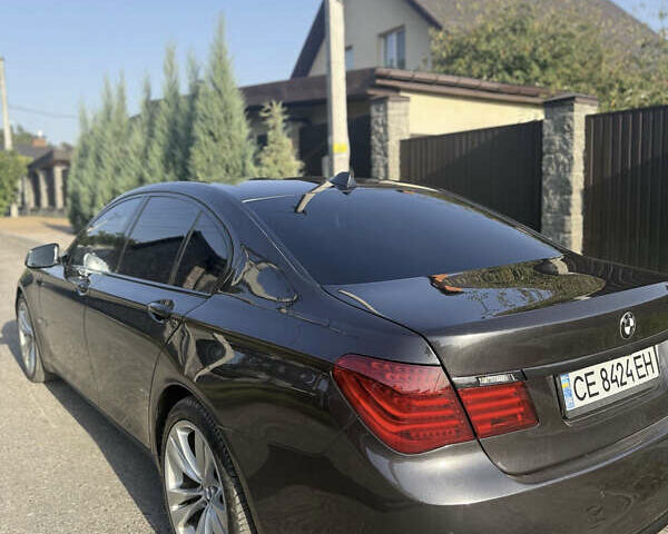 Черный БМВ 7 Серия, объемом двигателя 2.99 л и пробегом 390 тыс. км за 14000 $, фото 2 на Automoto.ua