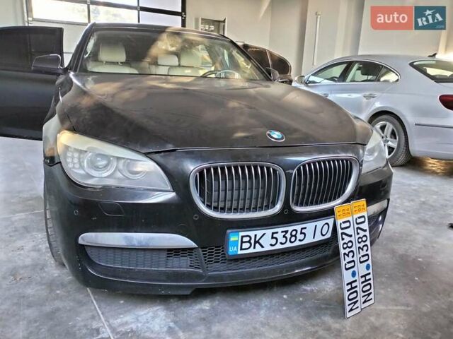 Черный БМВ 7 Серия, объемом двигателя 2.99 л и пробегом 240 тыс. км за 12700 $, фото 1 на Automoto.ua