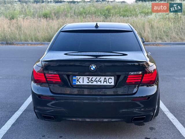Черный БМВ 7 Серия, объемом двигателя 2.99 л и пробегом 299 тыс. км за 18499 $, фото 9 на Automoto.ua
