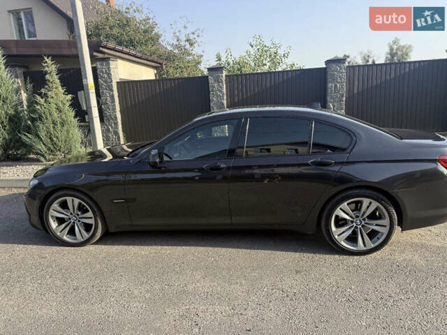 Черный БМВ 7 Серия, объемом двигателя 2.99 л и пробегом 390 тыс. км за 14000 $, фото 1 на Automoto.ua