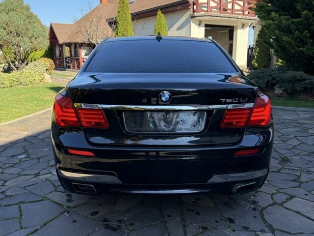 Черный БМВ 7 Серия, объемом двигателя 4.4 л и пробегом 300 тыс. км за 9990 $, фото 1 на Automoto.ua