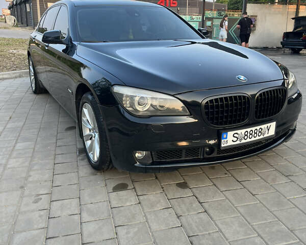 Черный БМВ 7 Серия, объемом двигателя 4.4 л и пробегом 300 тыс. км за 10500 $, фото 2 на Automoto.ua