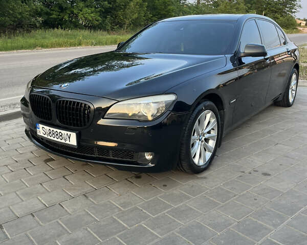 Черный БМВ 7 Серия, объемом двигателя 4.4 л и пробегом 300 тыс. км за 10500 $, фото 1 на Automoto.ua