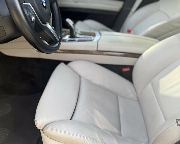 Черный БМВ 7 Серия, объемом двигателя 2.99 л и пробегом 390 тыс. км за 14000 $, фото 9 на Automoto.ua