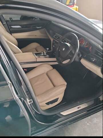 Черный БМВ 7 Серия, объемом двигателя 2.99 л и пробегом 240 тыс. км за 12700 $, фото 2 на Automoto.ua