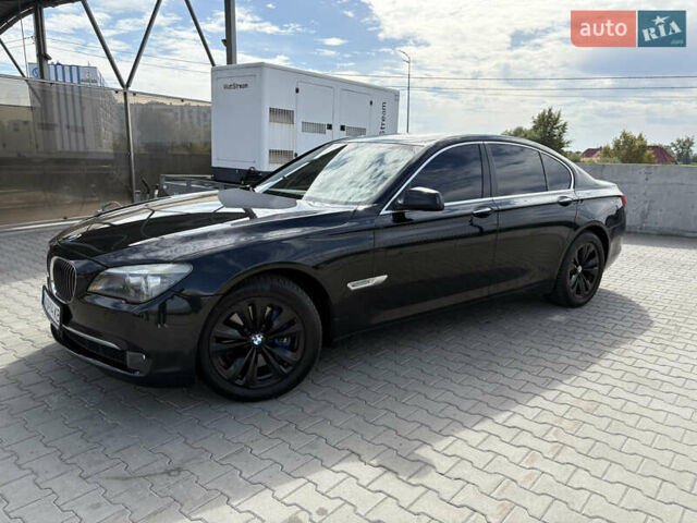 Черный БМВ 7 Серия, объемом двигателя 2.98 л и пробегом 250 тыс. км за 13500 $, фото 1 на Automoto.ua