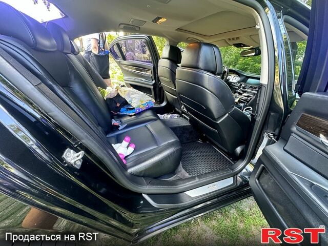 Черный БМВ 7 Серия, объемом двигателя 4.4 л и пробегом 177 тыс. км за 16500 $, фото 6 на Automoto.ua
