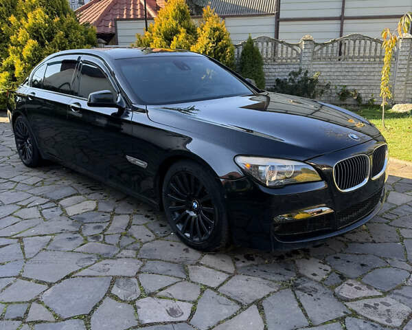Черный БМВ 7 Серия, объемом двигателя 4.4 л и пробегом 260 тыс. км за 11900 $, фото 3 на Automoto.ua