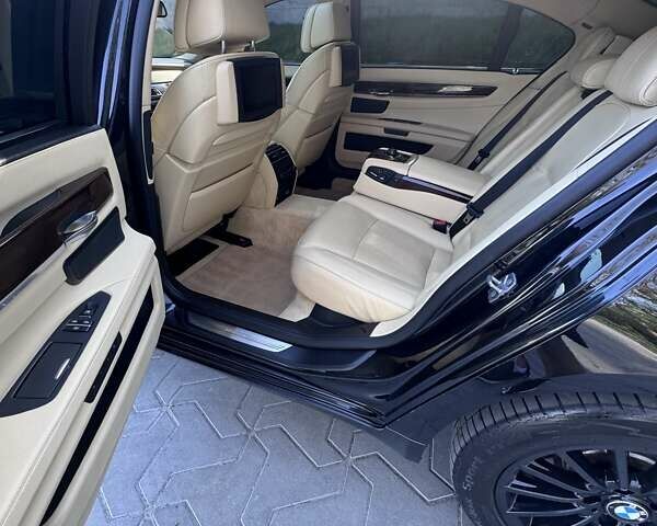 Черный БМВ 7 Серия, объемом двигателя 4.39 л и пробегом 213 тыс. км за 13700 $, фото 12 на Automoto.ua