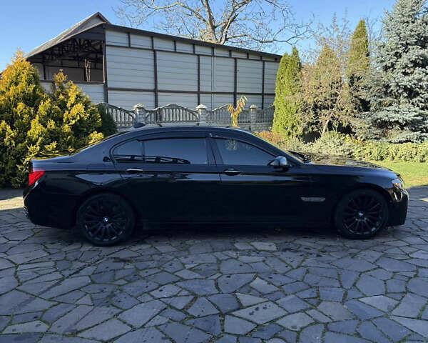 Черный БМВ 7 Серия, объемом двигателя 4.4 л и пробегом 260 тыс. км за 11900 $, фото 7 на Automoto.ua