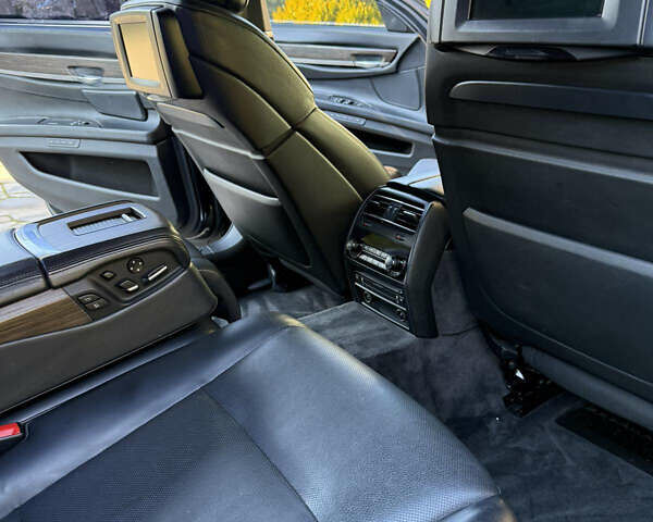 Черный БМВ 7 Серия, объемом двигателя 4.4 л и пробегом 260 тыс. км за 11900 $, фото 23 на Automoto.ua